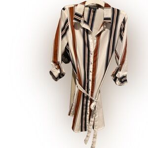 Long sleeve striped dress with belt and button sleeve details.